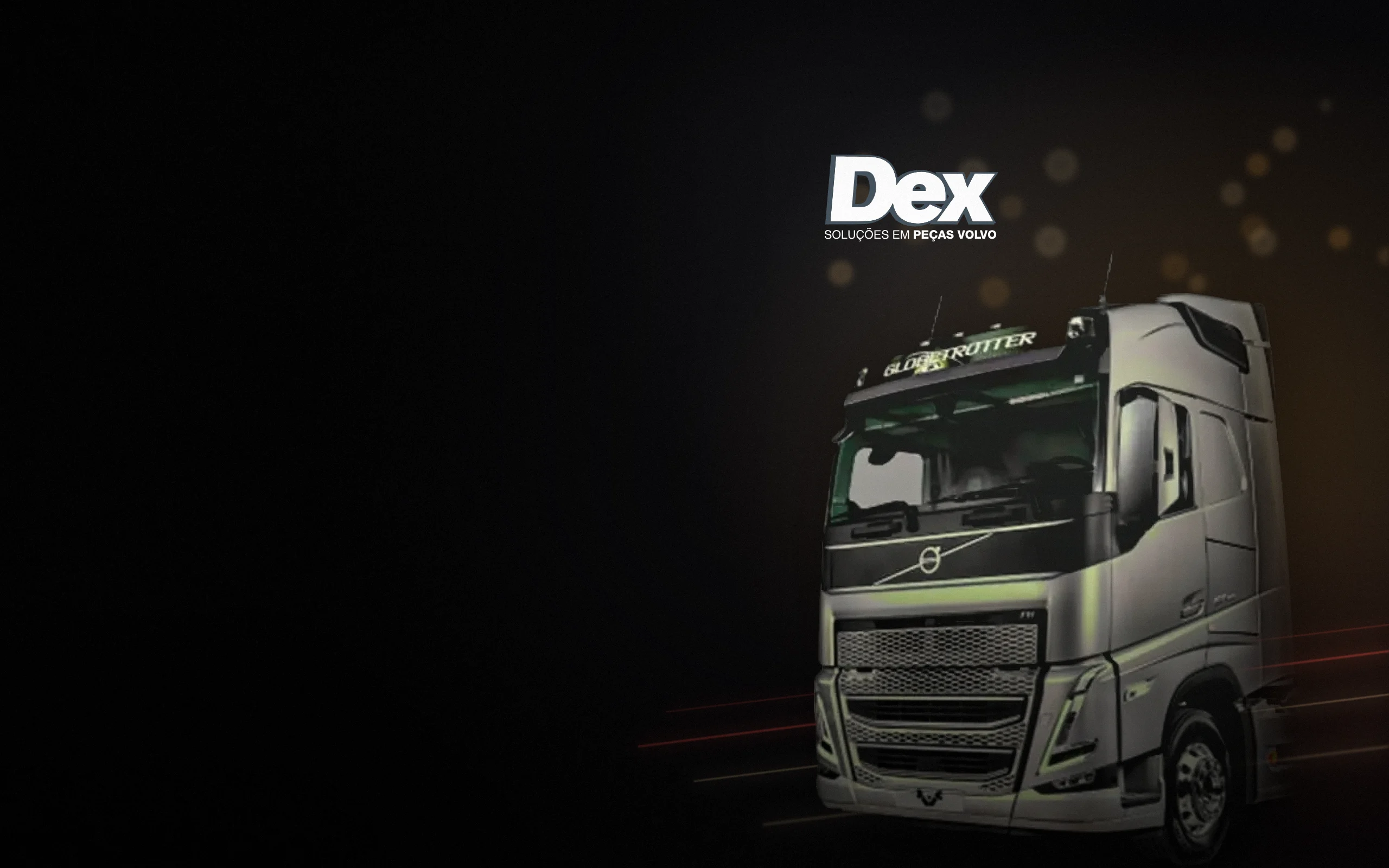 Caminhão Volvo prateado de frente, ao lado do logo da Dex Peças